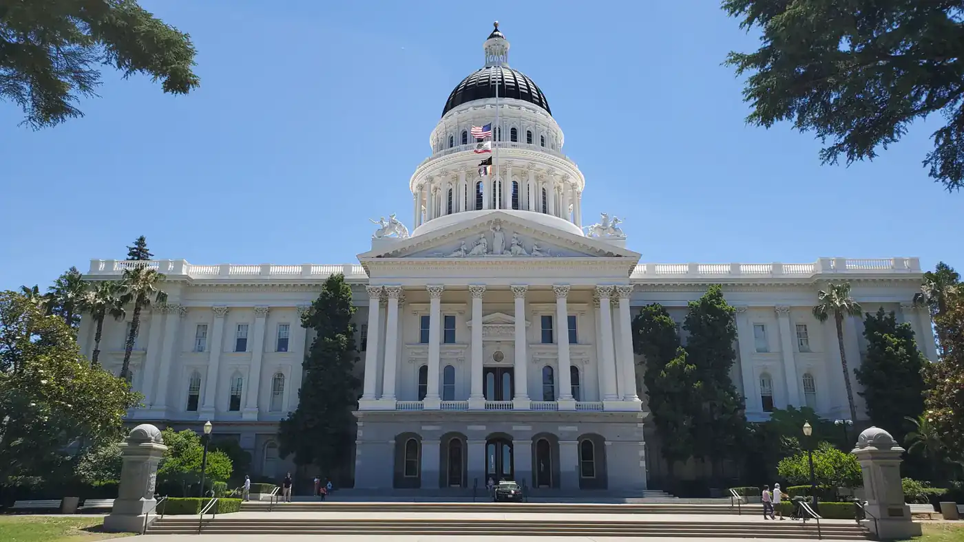 California State Capitol in Sacramento beneath a clear blue sky