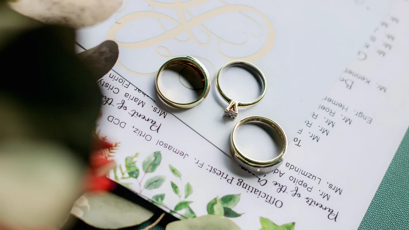 Wedding rings arranged on formal papers